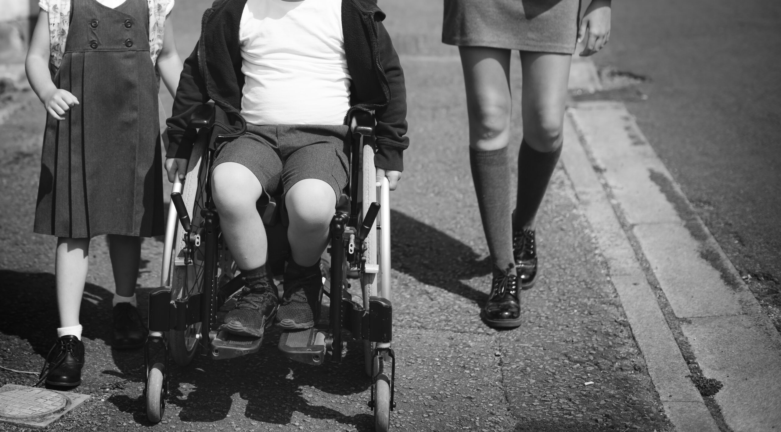 Sisters and brothers on their way to school
